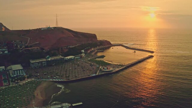  Aerial view sunset beach club in the district of Chorillos in Lima. Club Regatas.