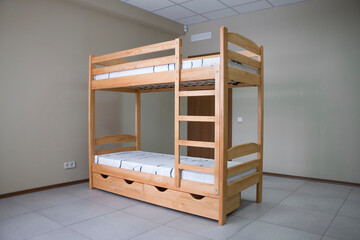 bunk wooden bed with drawers
