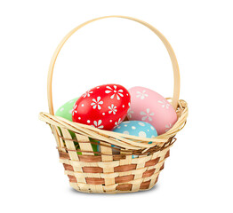basket with easter eggs on white isolated background