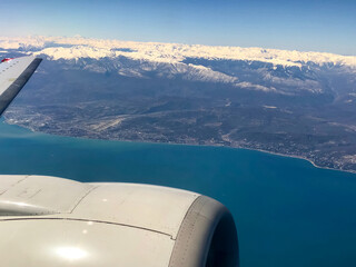 View from plane on the coast and mountains.