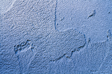 Abstract Wide Angle light blue stucco Background. Wall building Close up. Rough Surface plaster Texture With Copy Space for design.