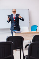 Old male business couch in the classroom during pandemic