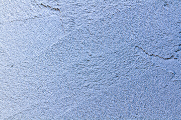 Abstract Wide Angle light blue stucco Background. Wall building Close up. Rough Surface plaster Texture With Copy Space for design.