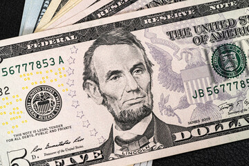 Close up of new five dollar banknote.