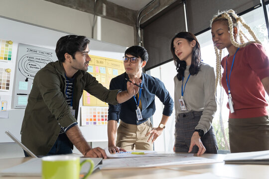 Group of business people team meeting in modern office working design planning and ideas concept