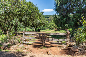Wood gate and farm field