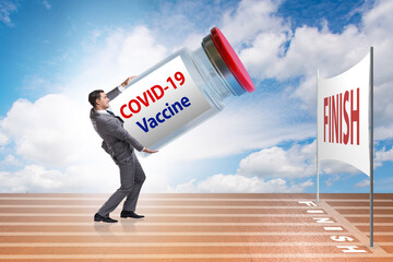 Businessman in covid-19 coronavirus vaccination concept