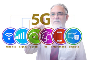 Businessman pressing button in 5g concept