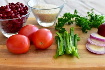Whole organic fresh ingredients for making homemade tasty healthy vegetarian hearty one pot winter comfort chillis, soups and stews