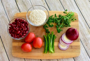 Whole organic fresh ingredients for making homemade tasty healthy vegetarian hearty one pot winter comfort chillis, soups and stews