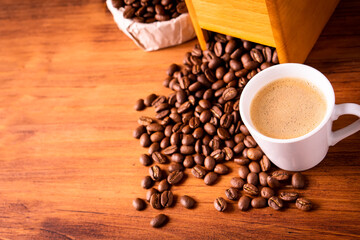Fresh cafe for morning breakfast refresh caffeine white cup roasted organic coffee bean farm in vintage wood grinder classic metal coffee pot for black espresso and cream milk cappuccino latte