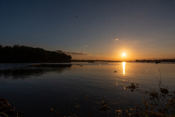 Beautiful sunset tropical beach with palm tree and pink sky for travel and vacation in holiday relax time