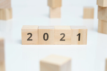 2021 on wooden blocks with a common theme.