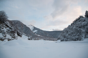 Obraz premium Majestic sunset in the winter mountains landscape. Dramatic sky. Azerbaijan nature.