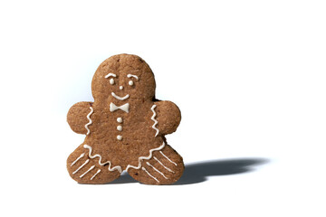 Gingerbread man with shadow isolated on white background