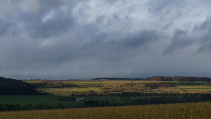 Fototapeta premium German landscape in Eifel with fields and a farm building on sunny winter day