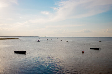Fototapeta premium Fishing boat on the shore on lake