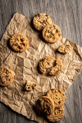 freshly baked Chocolate chip cookies on a wooden table with place for text. Copy space.