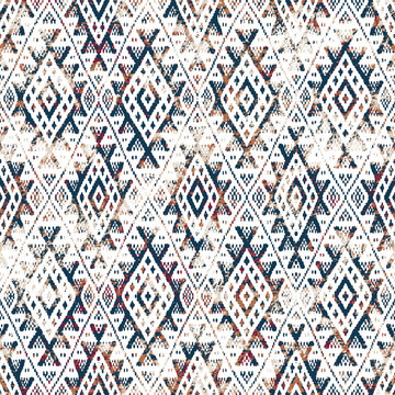 Geometric kilim ikat pattern with grunge texture
