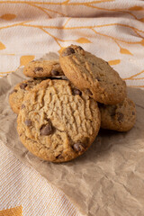 Pile of vanilla cookies on rustic paper