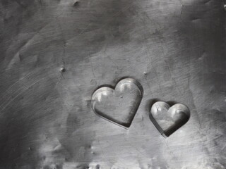 couple bread molds stainless Heart shaped on aluminum tray background, love Valentine Day for copy text card, background
