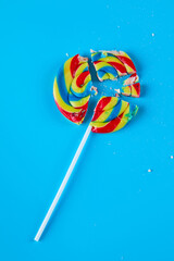 Colorful lollipop on blue background