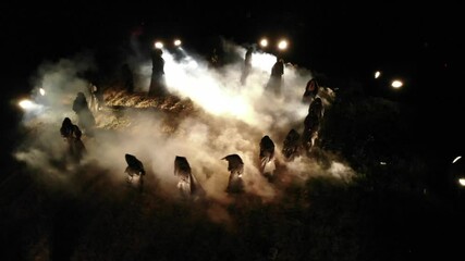 Sect. people in black coats. rite, cult