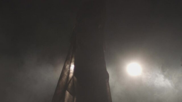 Sect. people in black coats. rite, cult
