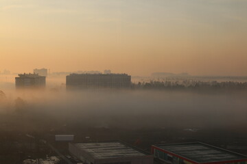 fog in the morning at dawn in the city