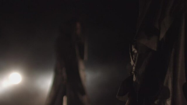 Sect. people in black coats. rite, cult