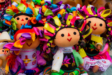 Fototapeta na wymiar colorful handmade dolls in mexico