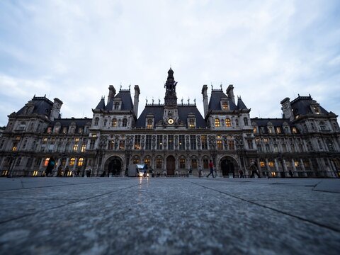 Exterior facade panorama view of Hotel de Ville Paris city town hall building palace Parvis courtyard France Europe