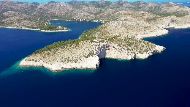 Lighthouse Cape Struga At The Southern Island Of Lastovo, Croatia. - aerial drone, wide shot