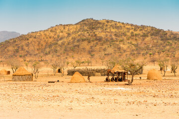 Village Of Himba People At A Mountain In Kaokoveld, Namibia