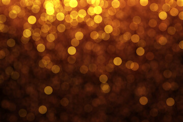abstract blurred defocused gold yellow bokeh light background