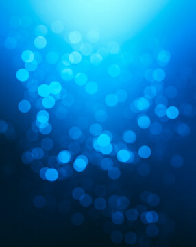 abstract blurred defocused blue bokeh light background