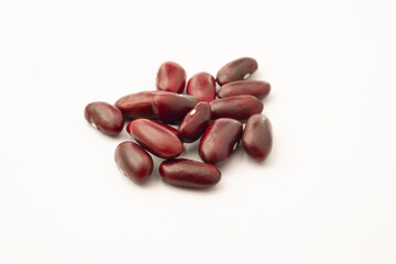 Close-up of kidney beans on white background. Dry red bean.