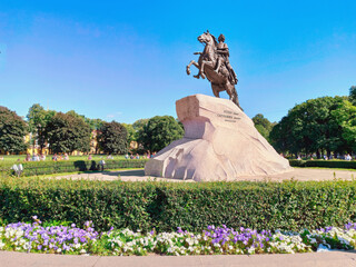 The Bronze Horseman - the famous equestrian statue of Peter the Great on Senate Square in St. Petersburg - a tourist attraction, view on a clear sunny day