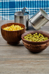 Green pea and corn beans in wooden cups