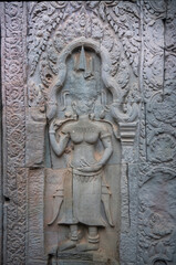  Та Prohm is the temple, it rains in the rainy season.The preserved symbiosis of stone and wood allows us to see Ta Prohm in this form.Bas-relief.(Cambodia, 04.10. 2019).