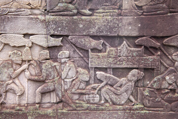  Bayon the central temple of Angkor Thom, late 12th century. Bas-relief. It rains in the rainy season. (Cambodia, 04.10. 2019)