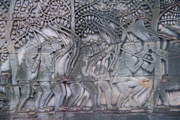   Bayon the central temple of Angkor Thom, late 12th century. Bas-relief. It rains in the rainy season. (Cambodia, 04.10. 2019)