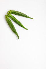 Fresh young okra isolated on white background