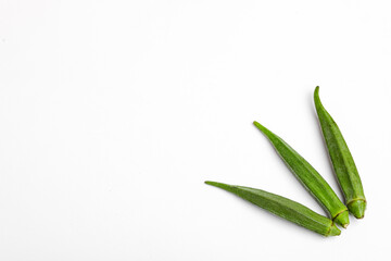 Fresh young okra isolated on white background