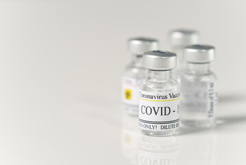 Covid-19 vaccine concept. vaccine in small glass ampoules