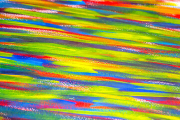 Background from different strokes of red, yellow, green and blue paint