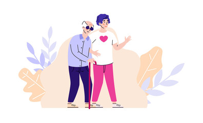 Volunteering, care and charity for old people with disabilities. Social worker helps to elderly man with cane and in dark glasses. Assistance and support patient in a nursing home.