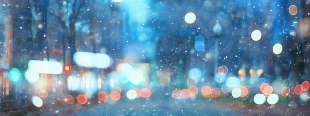 abstract snow blurred background city lights, winter holiday new year