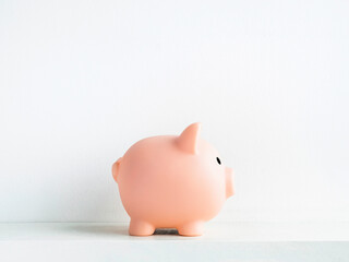 Cute piggy bank, pink color isolated on white background.