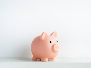 Cute piggy bank, pink color isolated on white background.